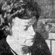 Reproduction of a newspaper photo of a woman's head