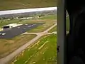 Just after takeoff, heading southwest from runway