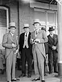 Men in morning grey suits at the races in Australia, in 1937