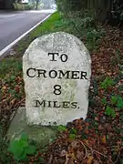 The other side of the same mile stone in High Kelling.