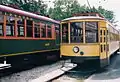 A 1924 elevated car from the Chicago Transit Authority (left) and a 1913 Twin City Rapid Transit Company streetcar (right)