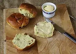 Krentenbollen are eaten with butter or cheese for breakfast, lunch, or as a snack.