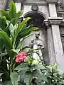 Statue of a Dominican saint on the eastern flank