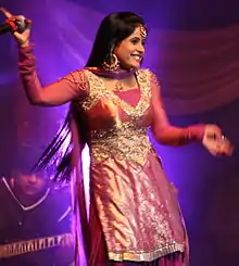 Miss Pooja performing in August 2009