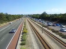 Photograph of freeway and railway