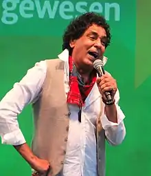 Mounir performing at the Deutscher Evangelischer Kirchentag 2019 in Dortmund, Germany