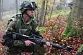 Image 9A soldier from Moldova pulls security while conducting a company situational training exercise during exercise Combined Resolve III at the Joint Multinational Readiness Center in Hohenfels, Germany, Oct. 26, 2014