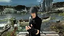 A first person view of a large open lake with boats in the background and Noctis smiling in the foreground standing directly in front of the player and making a open friendly gesture with his left hand.