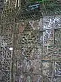Diamond shape embellishments and other vermiculate designs and details.