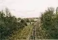 Moor Lane Goods Yard, by Brettell Lane railway station, near Stourbridge in 2004. The carriage sidings (left after the metal fencing) are now out of use and partly removed (part lifted).