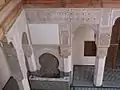 One of the fountains in the gallery of the courtyard of the house