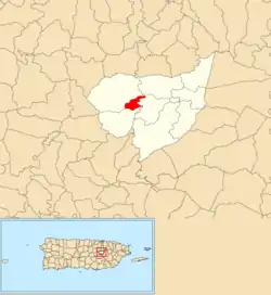 Location of Mulita within the municipality of Aguas Buenas shown in red