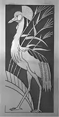 Crane (Balearica regulorm) with reeds behind (Phragmites australis)