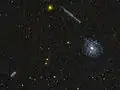 NGC 5963, NGC 5965, and NGC 5971 by GALEX