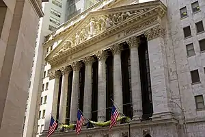 A tall colonnade in front of the building's main facade at 18 Broad Street
