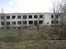 The building of the new school in the village. Photo of 2007. (.mw-parser-output .geo-default,.mw-parser-output .geo-dms,.mw-parser-output .geo-dec{display:inline}.mw-parser-output .geo-nondefault,.mw-parser-output .geo-multi-punct{display:none}.mw-parser-output .longitude,.mw-parser-output .latitude{white-space:nowrap}51°15′39″N 29°17′41″E﻿ / ﻿51.260824°N 29.294760°E﻿ / 51.260824; 29.294760)