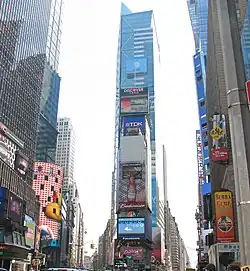 Shows all the billboards at the building such as Discover Card, TDK, Cup Noodles and Budweiser.
