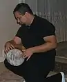 Man playing a doumbek