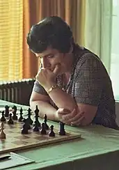 Gaprindashvili staring at the board while playing chess