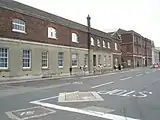 Former Smithery (left, 1791-4); Stores & Workshops (right, 1782; one of four identical blocks).