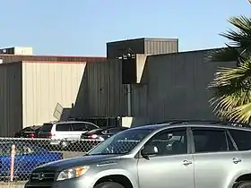 East side (Castle Rock Rd.), showing windowless concrete construction that is typical of the campus