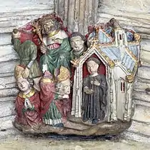St Denis is executed, then walks with his severed head to the church. Boss form the north walk, 1423–1426