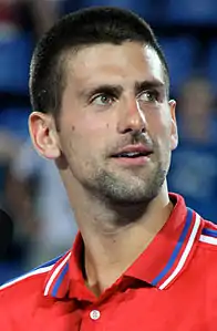 Novak Djokovic, the winner of the 2022 gentlemen's singles. It was his twenty-first major title and his seventh Wimbledon title.