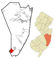 Map of Mystic Island in Ocean County. Inset: Location of Ocean County in New Jersey.