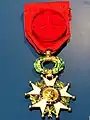 The insignia of an officer class of the Legion d'Honneur from the current Fifth Republic.