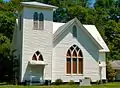 The Omaha Baptist Church was established in the late 1800s. The present building was constructed in 1914 following a tornado that destroyed much of the town including the original church building in 1913.