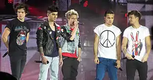 One Direction performing in Glasgow on their Take Me Home Tour, 27 February 2013. From left to right: Harry Styles, Zayn Malik, Niall Horan, Liam Payne, and Louis Tomlinson
