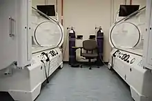 Two 36" Mono-place Hyperbaric Chambers manufactured by Perry Baromedical, used to facilitate 100% medical grade oxygen to heal and reduce inflammatory processes within the body.