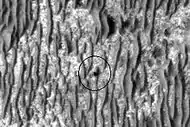 Opportunity as seen by HiRISE on January 29, 2009. Opportunity is on its way to Endeavour Crater, 17&nbsp;km (11&nbsp;mi) away at this point.
