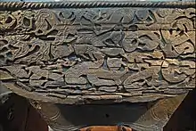 Detail of the Oseberg wagon's depiction of nine cats.