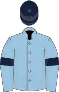 Light blue, dark blue armlets, dark blue cap
