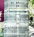 The inscription on the stone marking the Paris Meridian, made in 1806, and originally placed in the garden of the Paris Observatory. The name of the Emperor Napoleon was erased from the monument after the Restoration of the Monarchy.