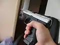 RAM P99 (note the red dot meaning "cocked" at the rear of the slide)