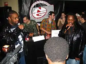 P.M. Dawn performing in 2006 (Note: Prince Be on the left and his infamous cousin Doc. G on the right)