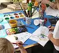 Painting butterflies on an Open Day