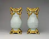 Pair of Chinese vases with French Rococo mounts; the vases: early 18th century, the mounts: 1760–70; hard-paste porcelain with ormolu mounts; 32.4 x 16.5 x 12.4&nbsp;cm; Metropolitan Museum of Art