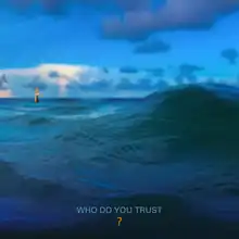 The ocean seen against a cloudy sky with a hand in the background.