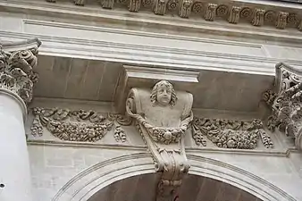 Pair of festoons at the entrance of the Église Saint-Paul-Saint-Louis (Paris)