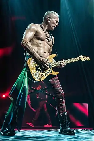 Collen performing in 2018