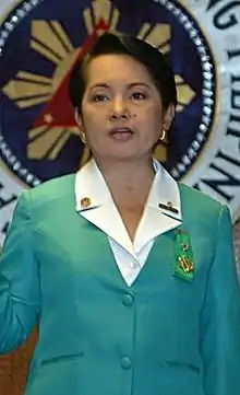 Philippine President Gloria Macapagal-Arroyo during the presentation ceremonies of the 31st Chief Girl Scout Medal Scheme at the Heroes Hall, Malacanang Palace (081128-NCR-01MA) (half-body crop).jpg