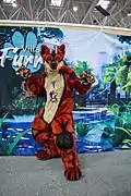 A big red and black demon wolf