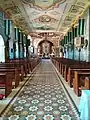 View from the door looking forward to its main altar.