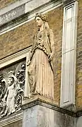 One of four caryatids on the east front of Pitzhanger Manor. Modelled on the sanctuary of Pandrosus, Athens.