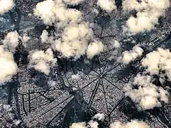 Place Charles de Gaulle seen from an airliner at 35,000 feet (11,000&nbsp;m).