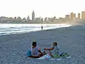Poniente beach in Benidorm when the sun sets.