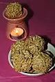 Gur mamra laddu sweets made from jaggery and puffed rice.